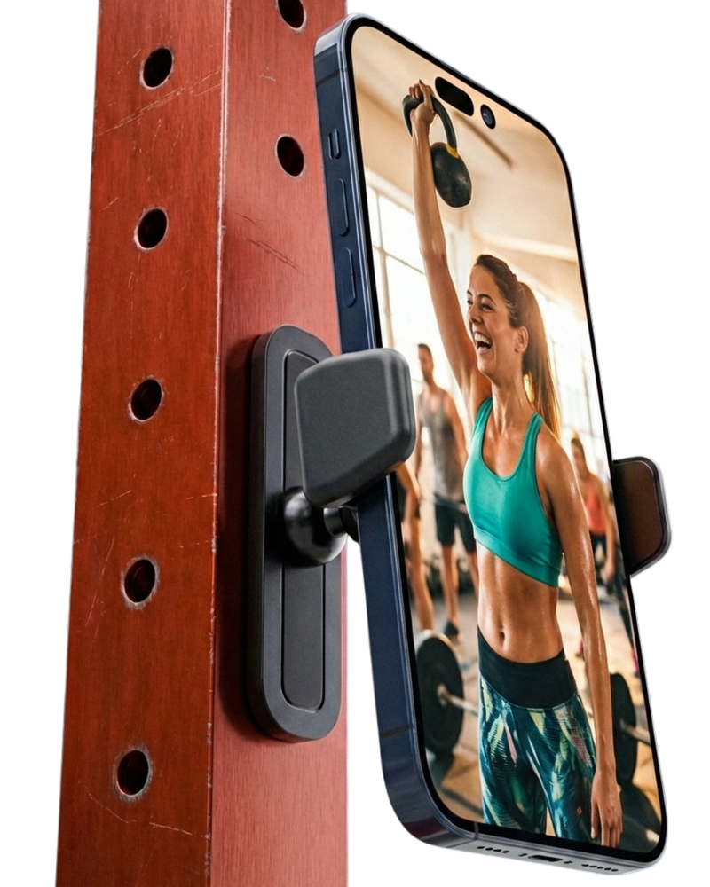 Phone case with a clip attached to a wooden surface, displaying a fitness-themed photo on the phone screen.